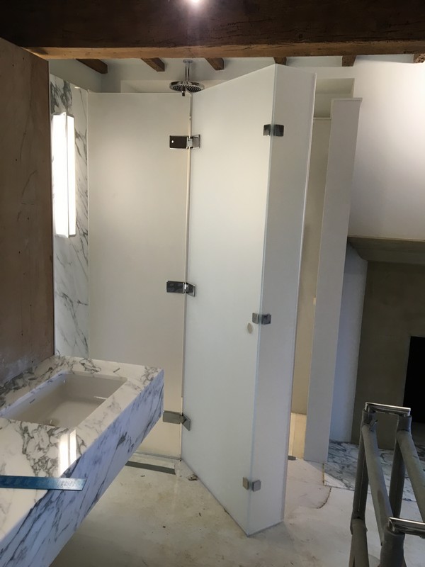 Bespoke frosted glass shower enclosure in Putney luxury bathroom