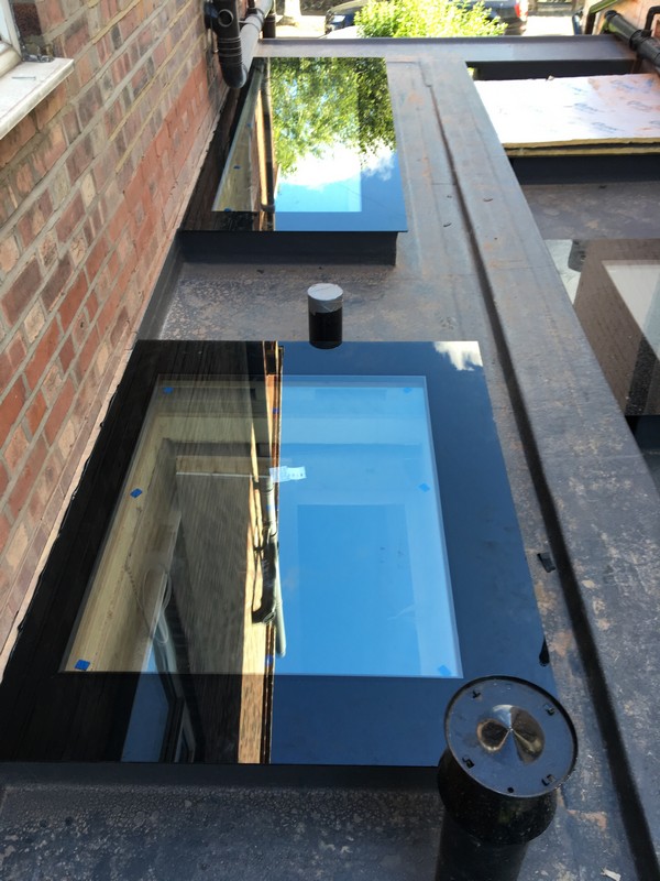 Multiple flat roof skylights on extension in Putney